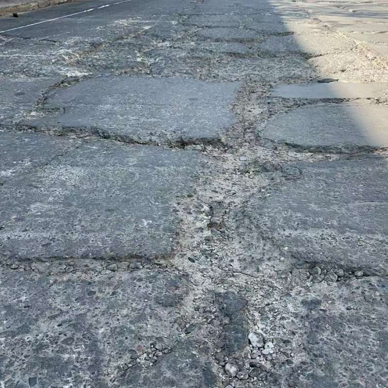 砚山路面起砂露石子修补料